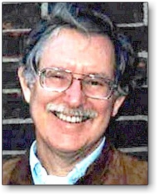 Ken Ring against brick background